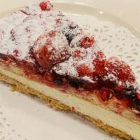 Mix Fruit Tart · Shortcrust pastry base filled with cream, topped with a layer of sponge cake & garnished wit...