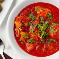 Chicken Vindaloo · A goan special delicacy, combination of vinegar marinated chicken cubes in tomato sauce.