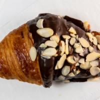 Chocolate Croissant · Buttery croissant dipped in chocolate to add some sweetness in it
Contains: Wheat, Milk, Egg...