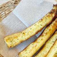 Garlic Rusk · Toasted baguette slices with savory garlic butter