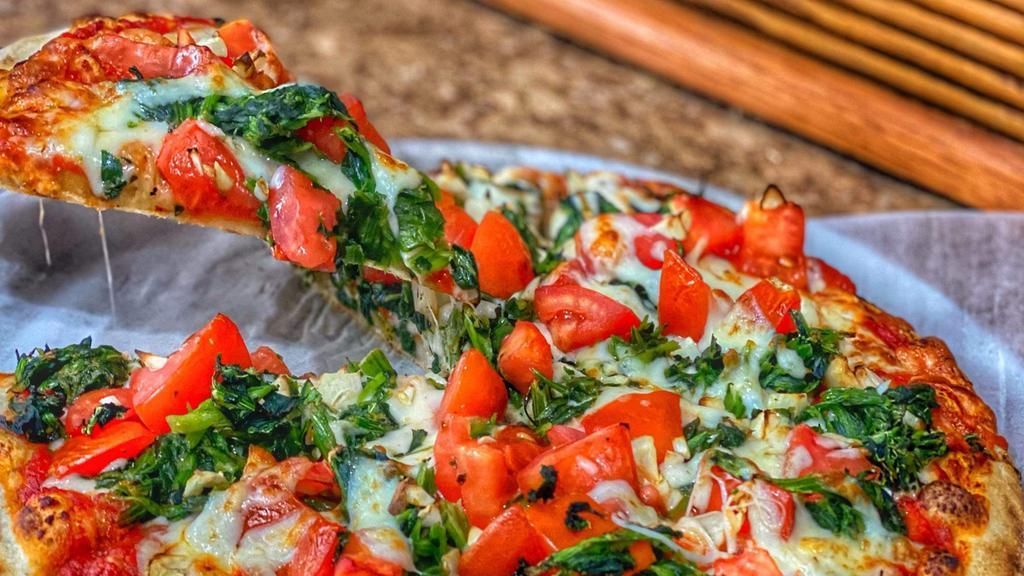 The Godfather · Chef's Favorite. 
Spinach, tomatoes, and fresh garlic