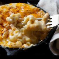 Three Cheese Mac · Chef's Favorite. Elbow mac baked with a three cheese sauce and melted cheese on top.