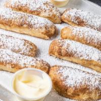 Cinnamon Sticks (8 Pcs.) · Chef's Favorite. 
Comes with our famous ice cream dip