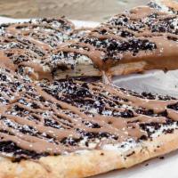 Cookies & Cream Pie · Sweet dough baked with our secret sauce, topped with cookie crumbs and a drizzle of swiss mi...