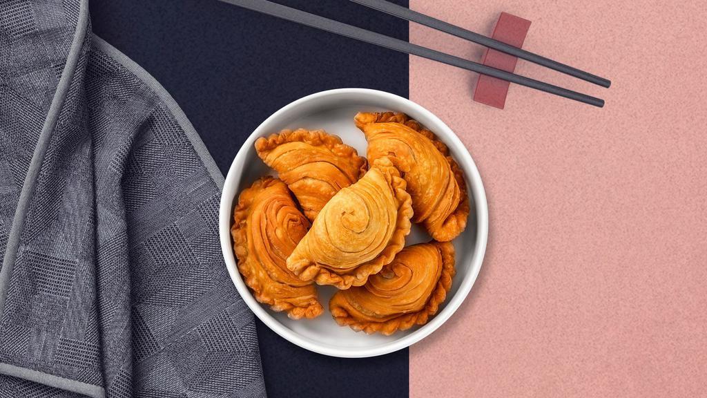 Power Puff Curry · Puff pastry stuffed with sweet organic soybean.
