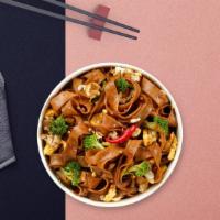 Pop Up Pad See Ew · Wok-fried flat noodle, Chinese broccoli with vegan sweet brown sauce.