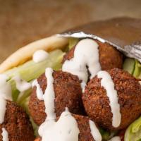 Falafel Gyro · Halal. Meatless sandwich made from chickpeas and spices wrapped in a pita.