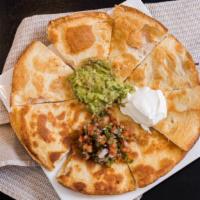 Crispy Quesadillas · Chicken, steak or cheese, guacamole, sour cream and pico de gallo.