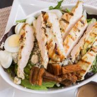Chicken Cobb Salad · Mixed greens, diced grill chicken, crispy pork belly, crumbled bleu cheese, eggs, avocado, c...