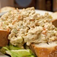 Chicken Salad · Homemade grilled chicken, mixed light mayonnaise, carrots, celery, peppers, on a bed of lett...