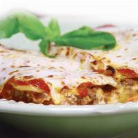 Lasagna · Served with meat.