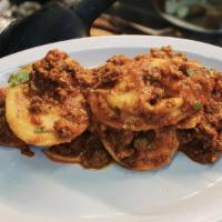 Ravioli Bolognese · Served in our homemade bolognese sauce.