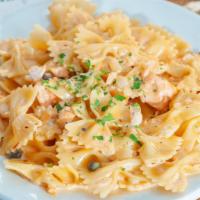 Farfalle Alla Nina. · Bowtie pasta with salmon and capers in a light cream sauce.