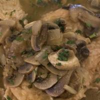 Chicken Marsala · Pan seared chicken with sauteed mushrooms and onions in a marsala wine sauce.