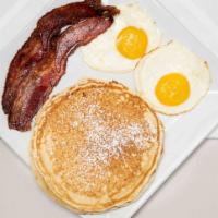 2 X 2 X 2 · Two pancake or French toast, two eggs, and choice of meat.
