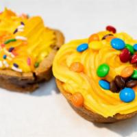 Frosted Cookie Cupcake · Fresh Baked Cookie Cupcake topped with frosting and sprinkles