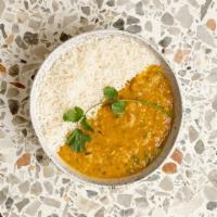 Daal Turka · Lentils cooked with tomatoes, onions and garlic with ground spices.