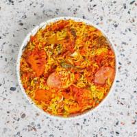 Vegetable Biryani · Saffron scented rice with mixed vegetables.