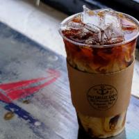 Iced Latte · 2 shots of Organic Espresso with milk served over ice - 20 oz