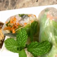 Fresh Summer Rolls · Rice paper wrappers rolled around fresh crunchy vegetables partnered with shrimp, fresh herb...