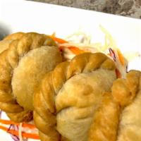 Curry Puff · Potato stuffed in puff pastry.