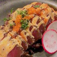 Pepper Tuna Tataki With Spicy Aioli · Light seared sliced of pepper tuna with spicy wasabi dressing