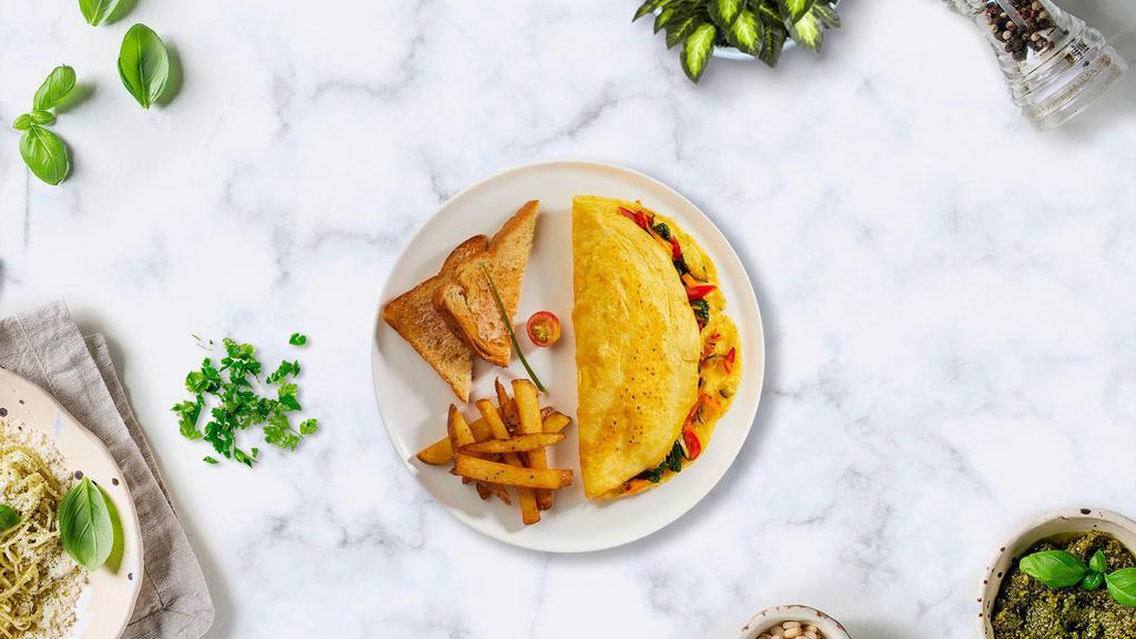 Shroom Cheese Omelette · Eggs cooked with cheese and mushrooms as an omelette served with toast and home fries.