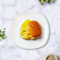 Cheesy Egg Sandwich · Fried egg and cheese on your choice of bread.