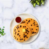 Choco Loaded Pancakes · Fluffy chocolate chip pancakes cooked with care and love served with butter and maple syrup....