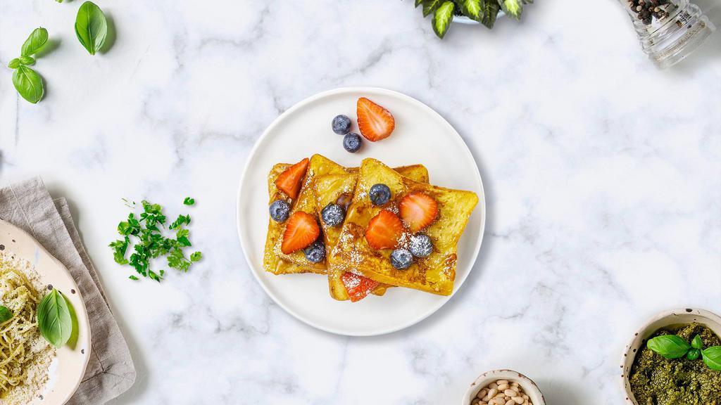 Fruity French Toast · French toast topped with blueberries, strawberries, and banana.