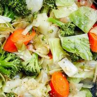 Mixed Vegetables · Mixed vegetables are prepared with a mix of broccoli zucchini carrots and cabbage sauteed in...