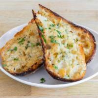 Garlic Bread · Grandaisy Ciabatta, Garlic Butter, Herbs, Parmesan