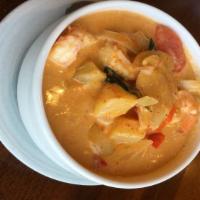 Pineapple Curry · Pineapple, coconut milk, onion, bell pepper, tomato, basil with red curry sauce.