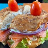 Nova Scotia Sandwich · Bagel with capers, onion, lettuce, tomato, Cream cheese, and nova scotia salmon.
