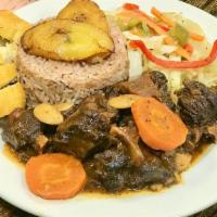 Oxtail · Delicious Oxtail served with your choice of White Rice or Rice & Beans and your choice of Sa...