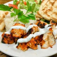Chicken Kebab Platter · Marinated Chicken Kebab served on a platter with choice of white rice or rice & beans, salad...