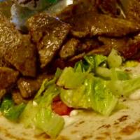 Gyro Pita Sandwich · Gyro is a combination of beef & lamb ground together to produce this delicious meat. Served ...