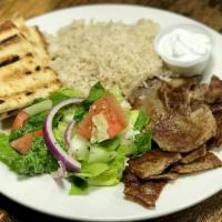Gyro Platter · Gyro served in a platter with choice of white rice or rice & beans, salad with toasted pita ...