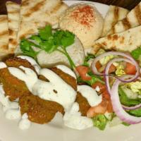 Falafel Platter · Falafel served on a platter with pita, hummus and choice of up to 2 sides.