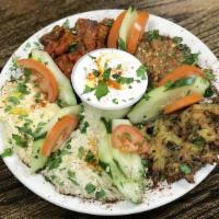 Vegetarian Sampler · Falafel, Hummus, Rice & Bean or Salad with Pita Bread.
