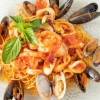 Zuppa Di Pesce · Fresh seafood with clams, shrimp, scallops, calamari & mussels in a marinara or fra diavolo ...