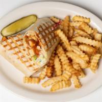 Greek Chicken Wrap · Grilled chicken with greek salad, wrapped in a soft tortilla, served with tzatziki sauce.