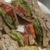 Wise Guys Club · Your choice of BLT, ham, roast beef, turkey or tuna salad stacked with bacon, lettuce, tomat...
