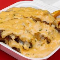 Chopped Impossible Fries (Vegetarian) · Impossible burger chopped up with American cheese, grilled onions and house sauce served on ...
