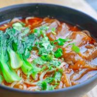 Beef Tendon Noodle Soup 台式牛筋面 · Hot & spicy.