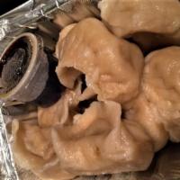 Steamed Meat Dumpling · 8 pieces.