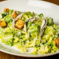 Caesar Salad · Chopped romaine, croutons, house made caesar dressing, and white anchoives.