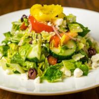 Chopped Mediterranean Salad · Chopped romaine, cucumber, tomato, red onion, black kalamata olives, feta cheese, and banana...