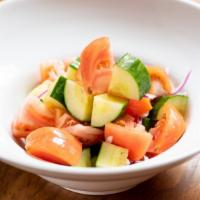 Tomato, Cucumber, & Red Onion Salad · Chopped plum tomatoes, cucumber, and red onion tossed in light vinaigrette dressing.