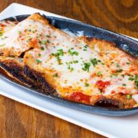 Eggplant Parmesan · Crispy eggplant, house blend of cheeses, and marinara sauce.